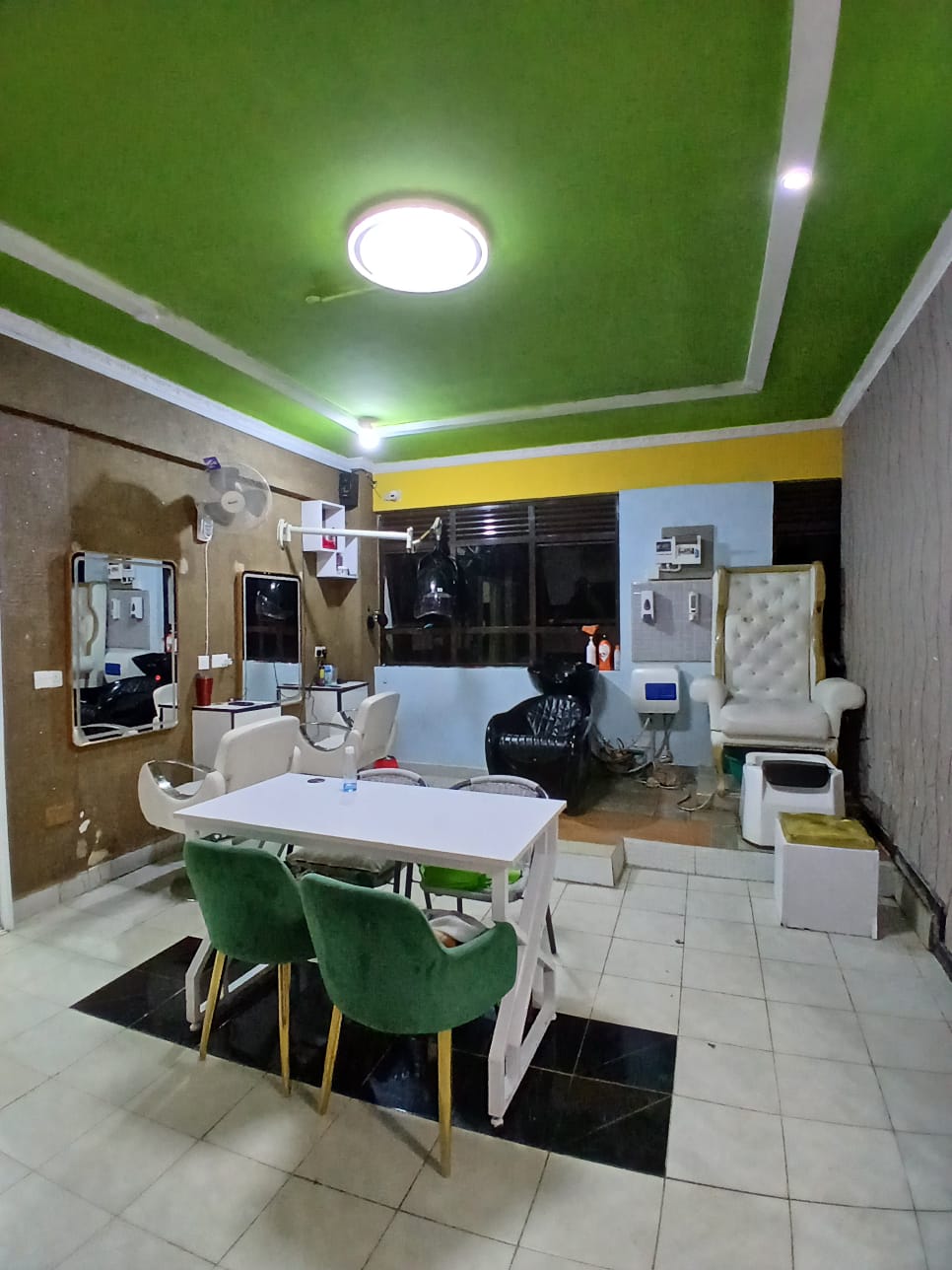 Sarma salon interior — nail station, pedicure throne and styling area